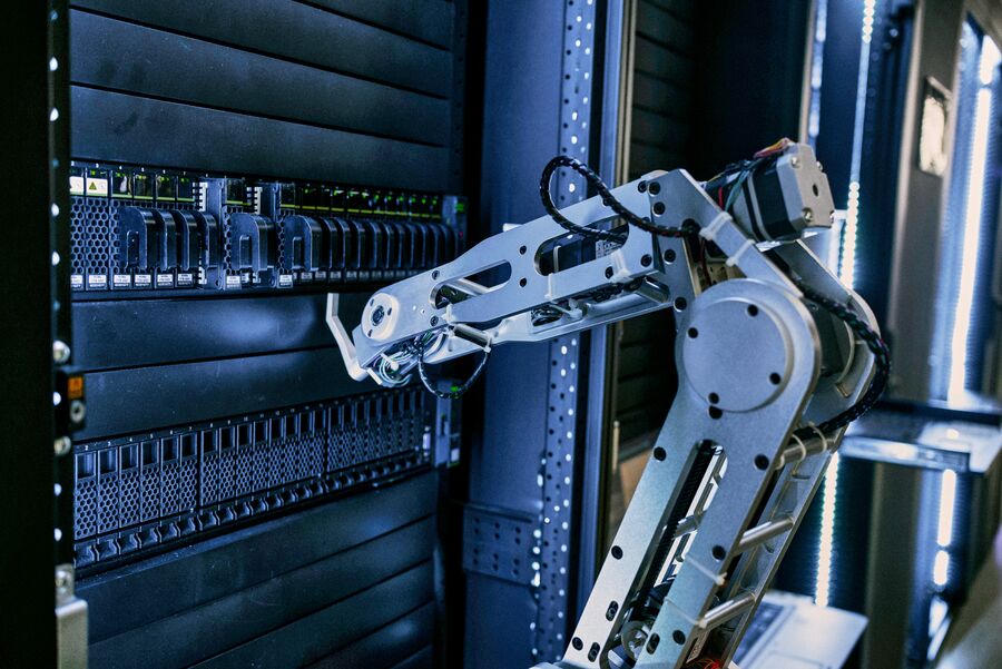 Medium Office 365 and Newsletters A robot arm operating in a data center